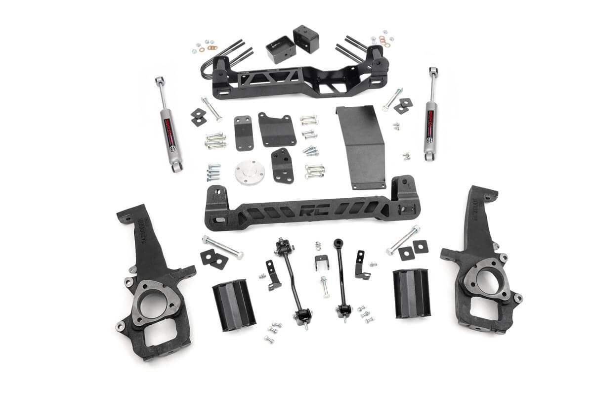 Give your RAM 1500 the perfect blend of performance, protection, and style with Rough Country's 6-inch Suspension Lift. Designed to offer an affordable way to maximize off-road performance and run up to 37-inch tires, these kits offer high quality, heavy-duty equipment for new model RAM 1500’s. Utilizing heavy-duty, laser cut, steel equipment engineered by Rough Country, these 6-inch Suspension Lifts are complete kits that include everything needed for outstanding off-road performance. High-clearance front and rear cross-members provide enough room for off-road climbs and runs. A heavy-duty skid plate shields the vehicle’s differential, protecting you from hazardous terrain. A durable set of driver and passenger side lifted cast knuckles are also included, helping to promote proper geometry once the vehicle is lifted. For true trailblazers, this kit also ships with a set of rear N3 Nitrogen-charged shock absorbers - valved specifically for a blend of on and off-road performance. Includes Rough Country's Lifetime Replacement Guarantee!