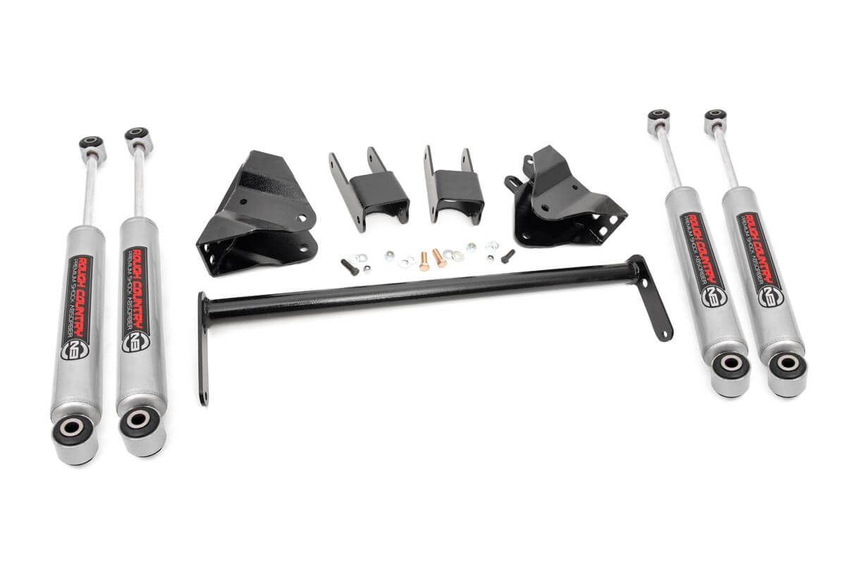 Give your 99-04 Ford Super Duty an impressive upgrade, front to back with Rough Country’s 2" Ford Leveling Lift Kit! This easy-to-install lift kit raises the front of your vehicle to be equal height with the rear for a leveled, better-than-stock look that gives an improved ride height and more aggressive appearance. This kit features a set of front, spring hanger brackets and shackles allowing you gain additional ride height without sacrificing ride quality or performance. All necessary components are provided to keep everything at optimum angles for a factory-like ride, even after lifting. A set of Rough Country's premium N3 shocks are also included. These fine tuned 10-stage variable high-pressure Nitrogen charged shocks offer a fantastic blend of off-road action and smooth highway ride quality. With a durable 18mm spring-loaded piston rod and faster-cooling 54mm shock body. Get the wheels you want! Rough Country's 2" Ford Leveling Lift Kit comes with everything you need to fit up to a 33" tire with proper wheel backspacing. Best of all, Rough Country's 2" Ford Leveling Lift Kit is backed by our Lifetime Replacement Warranty.