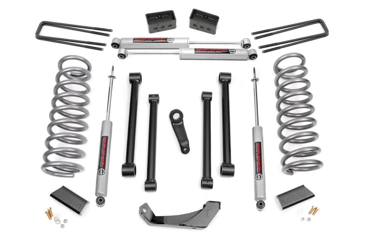 Give your Dodge an aggressive look from front to rear with Rough Country’s 5" Dodge Suspension Lift Kit! This easy-to-install leveling kit raises the front of your vehicle to be equal height with the rear for a leveled, flush look that gives a better ride height and more aggressive appearance.\
This kit features a set of front, durable coil springs allowing you gain additional ride height without sacrificing ride quality or performance. A set of track bar relocation bracket and control arms are provided to keep everything at optimum angles for a factory-like ride, even after lifting. Our fabricated rear blocks offer considerably more strength than their cast iron counterparts.\
A set of Rough Country's premium N3 shocks are also included in this kit. These fine tuned 10-stage variable high-pressure Nitrogen charged shocks offer a fantastic blend of off-road action and smooth highway ride quality. With a durable 18mm spring-loaded piston rod and faster-cooling 54mm shock body.\
Get the wheels you want! Rough Country's 5" Dodge Suspension Lift Kit comes with everything you need to fit up to a 35" tire with proper wheel backspacing.\
Best of all, Rough Country's 5" Dodge Suspension Lift Kit is backed by our Lifetime Replacement Warranty.